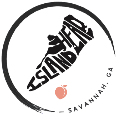 Black circle with words 'Island Head, Savannah, GA' and peach icon in center.
